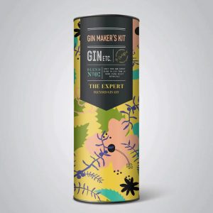 Colourful tin for the 'Expert' gin-making kit with floral design and branding.