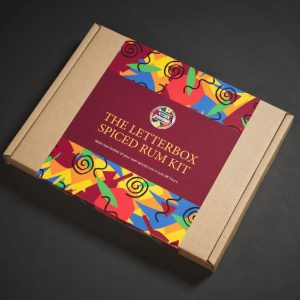 Closed spiced rum making kit in a box with colourful design.