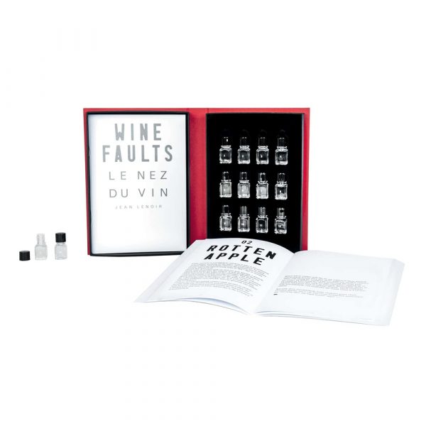 Le Nez Du Vin, Wine Faults Aroma Training Kit. Open red box displaying vials for identifying wine faults alongside a booklet, part of Le Nez Du Vin, Wine Faults Aroma Training Kit by Jean Lenoir.