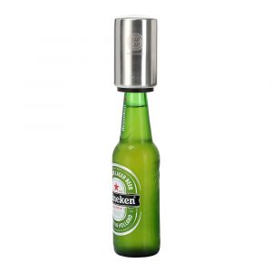 Stainless steel bottle opener on top of a Heineken beer bottle.