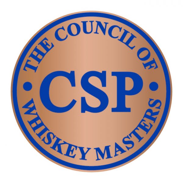 A round copper-coloured badge with blue text reading "The Council of Whiskey Masters" around the outer edge and "CSP" prominently displayed in the centre.