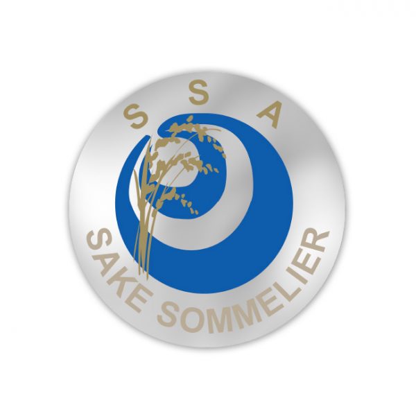 A silver and blue emblem with the text "Sake Sommelier" and the initials "SSA," featuring a stylized design of rice stalks.